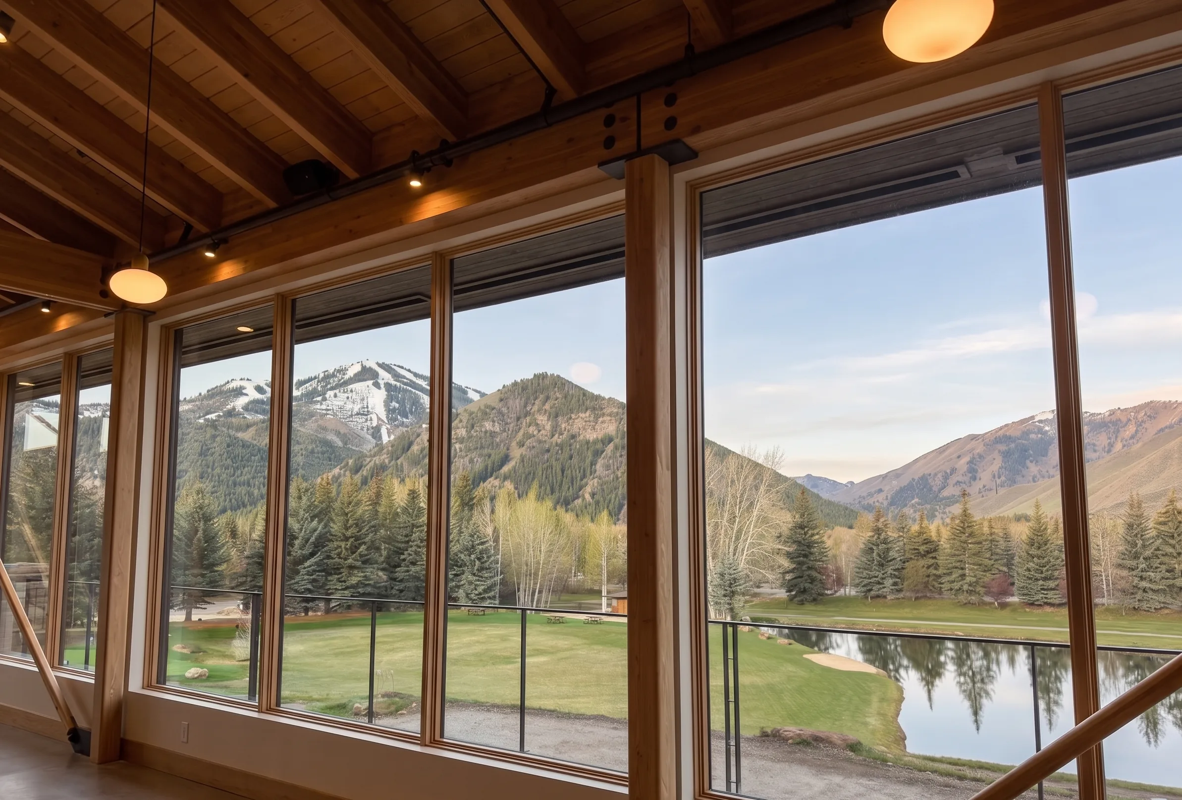Interior dining room at Timbers at Bigwood — warm wood, set tables, mountain views