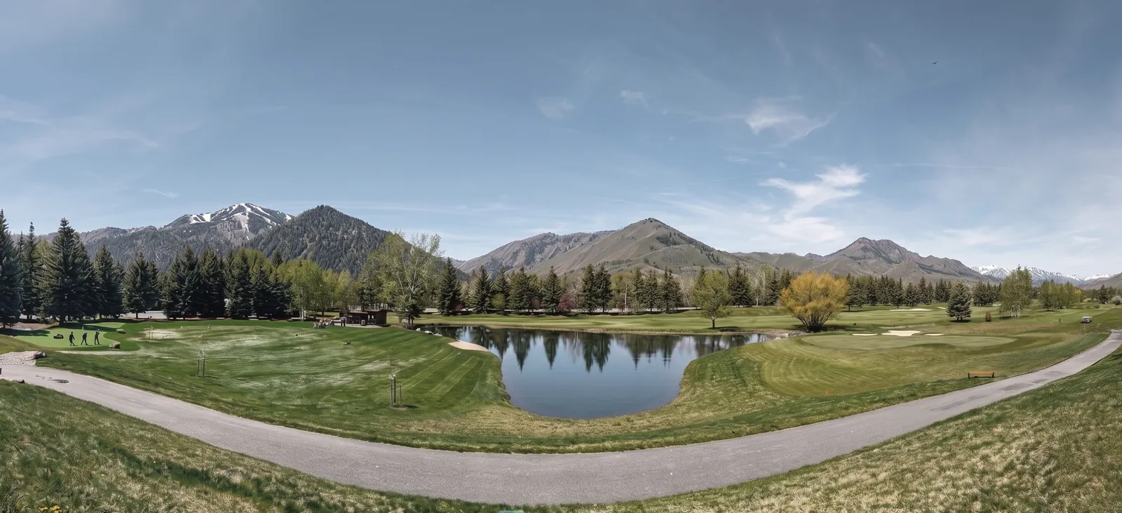 Panoramic view from the Timbers patio overlooking Bigwood Golf Course and the surrounding mountains